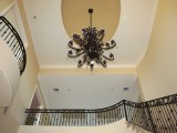 Chandelier and balcony in custom home in Fulton Ranch, Chandler AZ